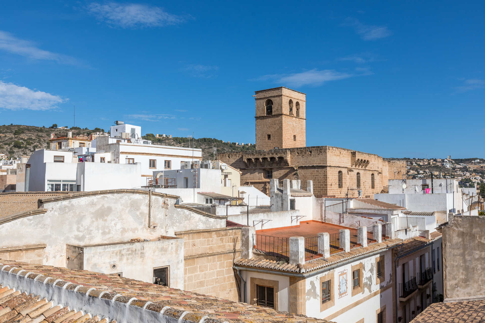 Jávea old town rooftops and church tower