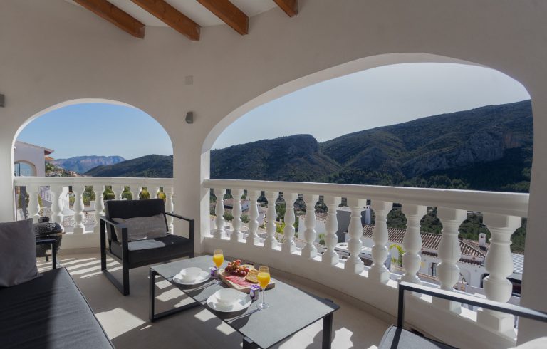 Covered terrace with arches at Villa Vino in Pedreguer