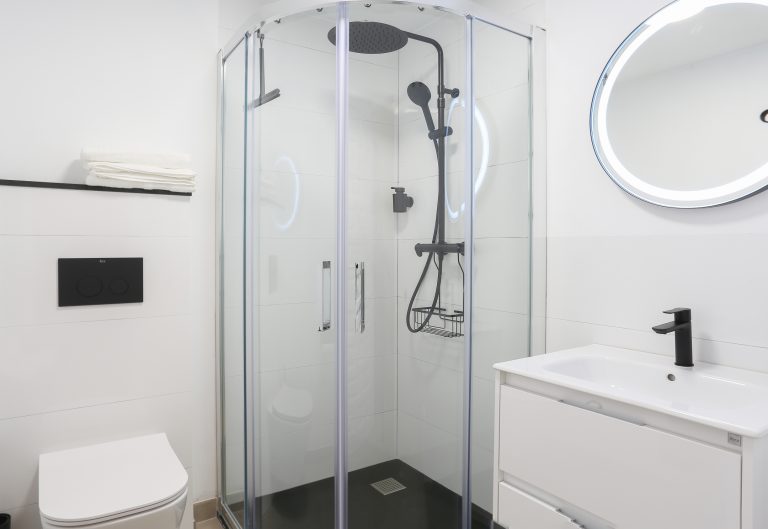 Bathroom with shower and sink at apartment Alquería Sol in Dénia