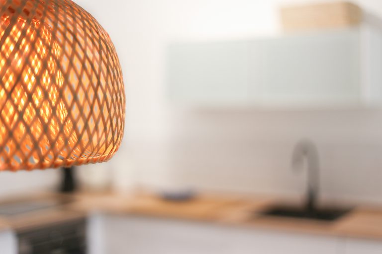 Kitchen detail with lamp at apartment Alquería Sol in Dénia