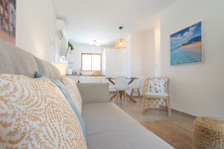 Living room with sofa at apartment El Patio in Dénia