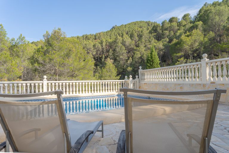 Terrace with view of the swimming pool at Villa Casa Joni in Orba