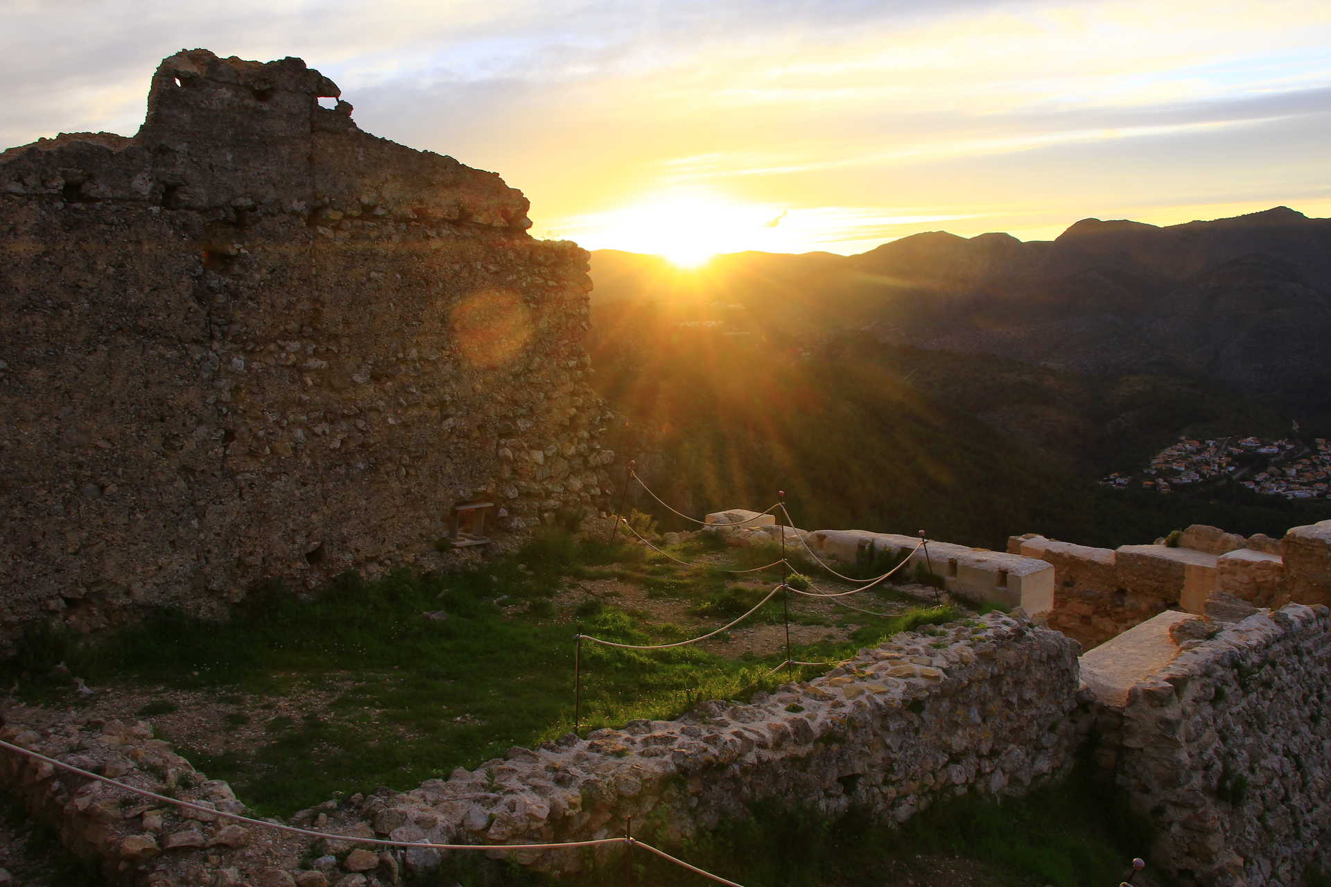 Valley landscape near Orba with mountains and green countryside