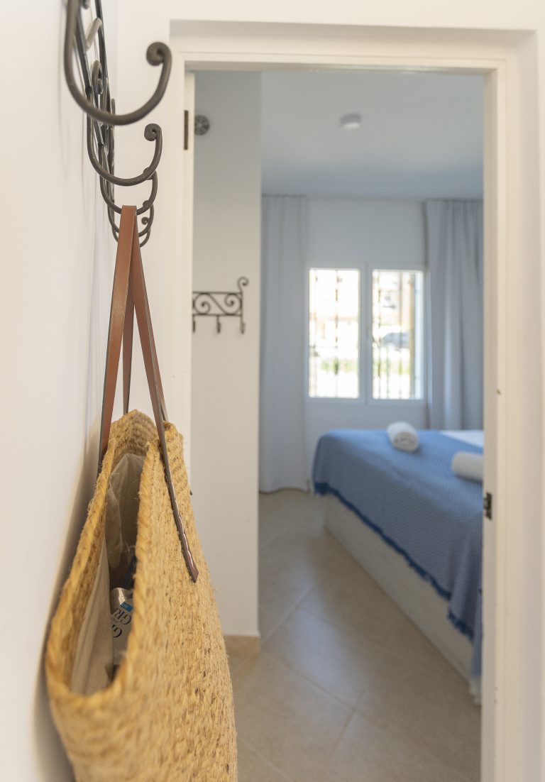 Hallway with coat rack at apartment Retiro Sol A1 in Dénia