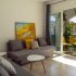 Living room with sofa and terrace doors at apartment Retiro Sol A09 in Dénia
