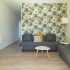 Living room with sofa and patterned wall at apartment Retiro Sol A09 in Dénia